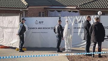 A woman was found dead at a home in Gordon, Canberra on Sunday morning.