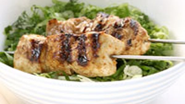 Chicken skewers with Greek lettuce salad