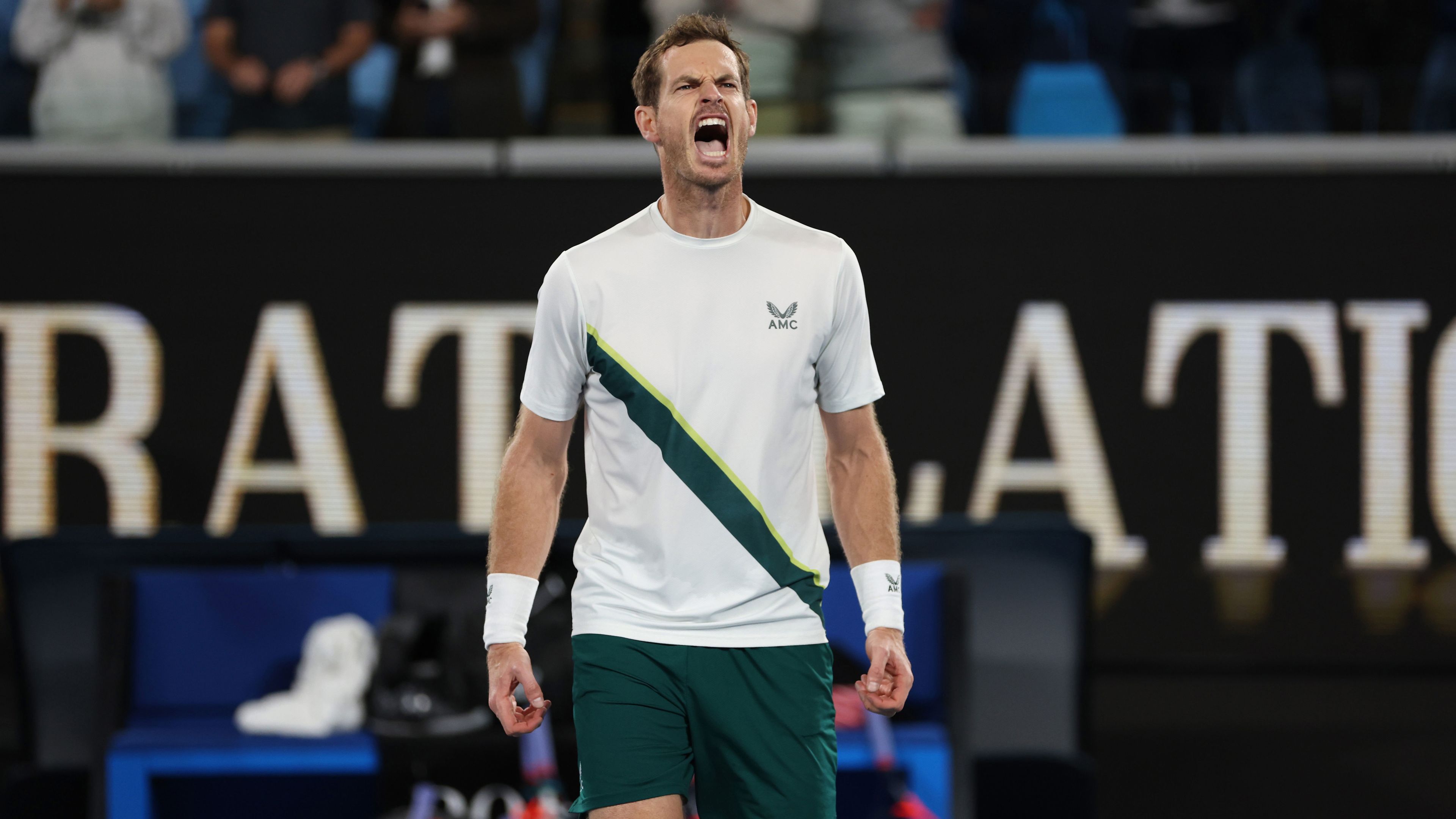 MELBOURNE, AUSTRALIA - JANUARY 19:  Andy Murray of Great Britain celebrates to the crowd after his five set victory in their round two singles match against Thanasi Kokkinakis of Australia during day four of the 2023 Australian Open at Melbourne Park on January 19, 2023 in Melbourne, Australia. (Photo by Clive Brunskill/Getty Images)