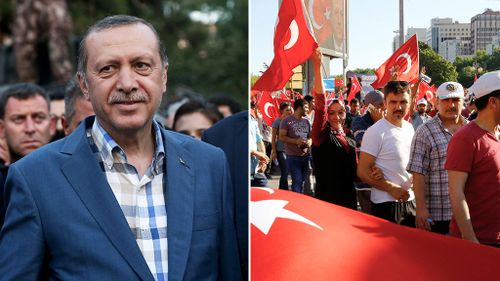 Turkish President Recep Tayyip Erdogan arrives to deliver a speech following the failed coup attempt; people gather at Kizilay Square to react the attempt in Ankara on July 16, 2016. (AFP)