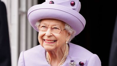 Queen Elizabeth II attends an armed forces act of loyalty parade in the gardens of the Palace of Holyroodhouse, Edinburgh, Tuesday, June 28, 2022.