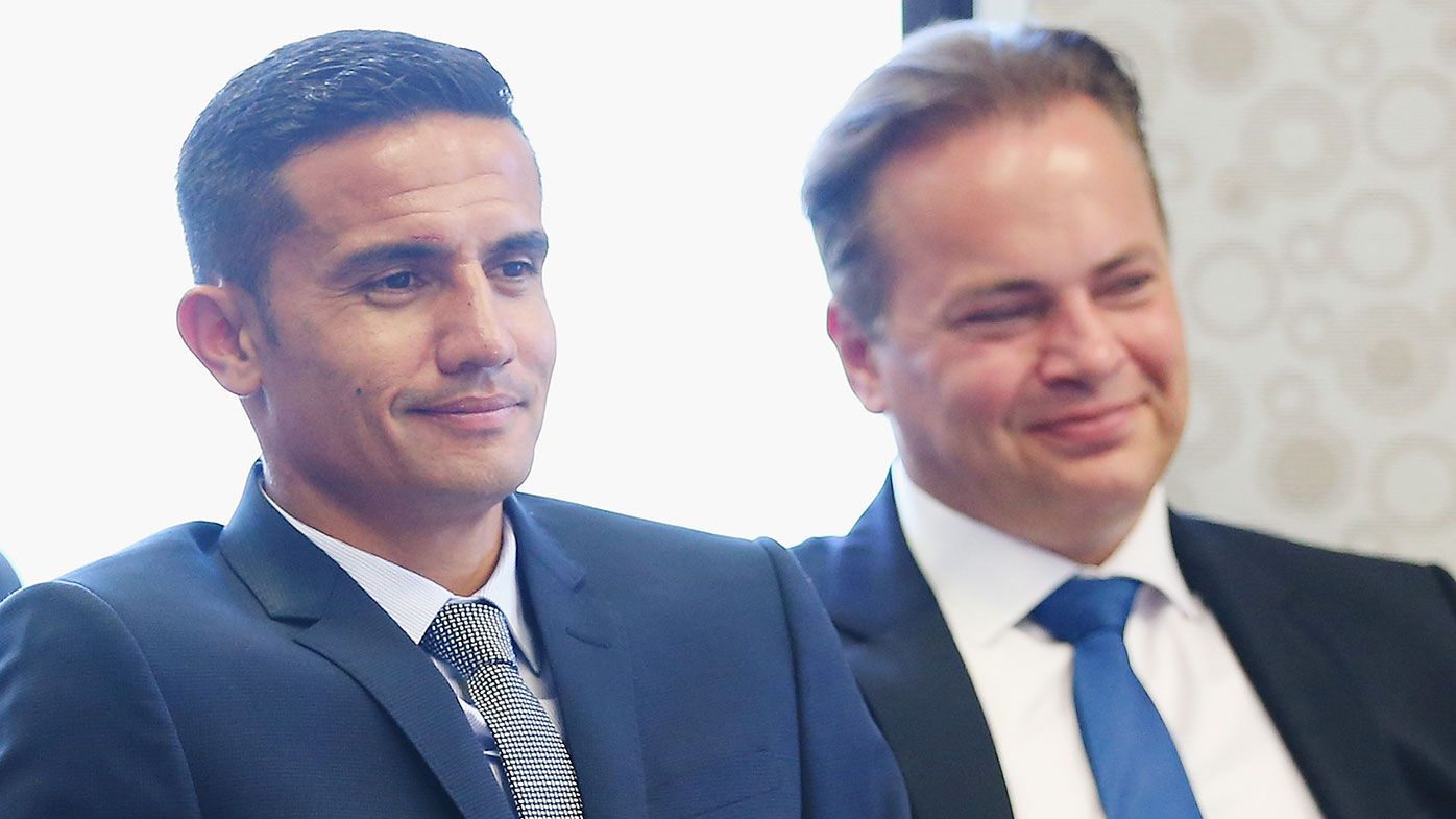 Tim Cahill (left) and Mark Bosnich