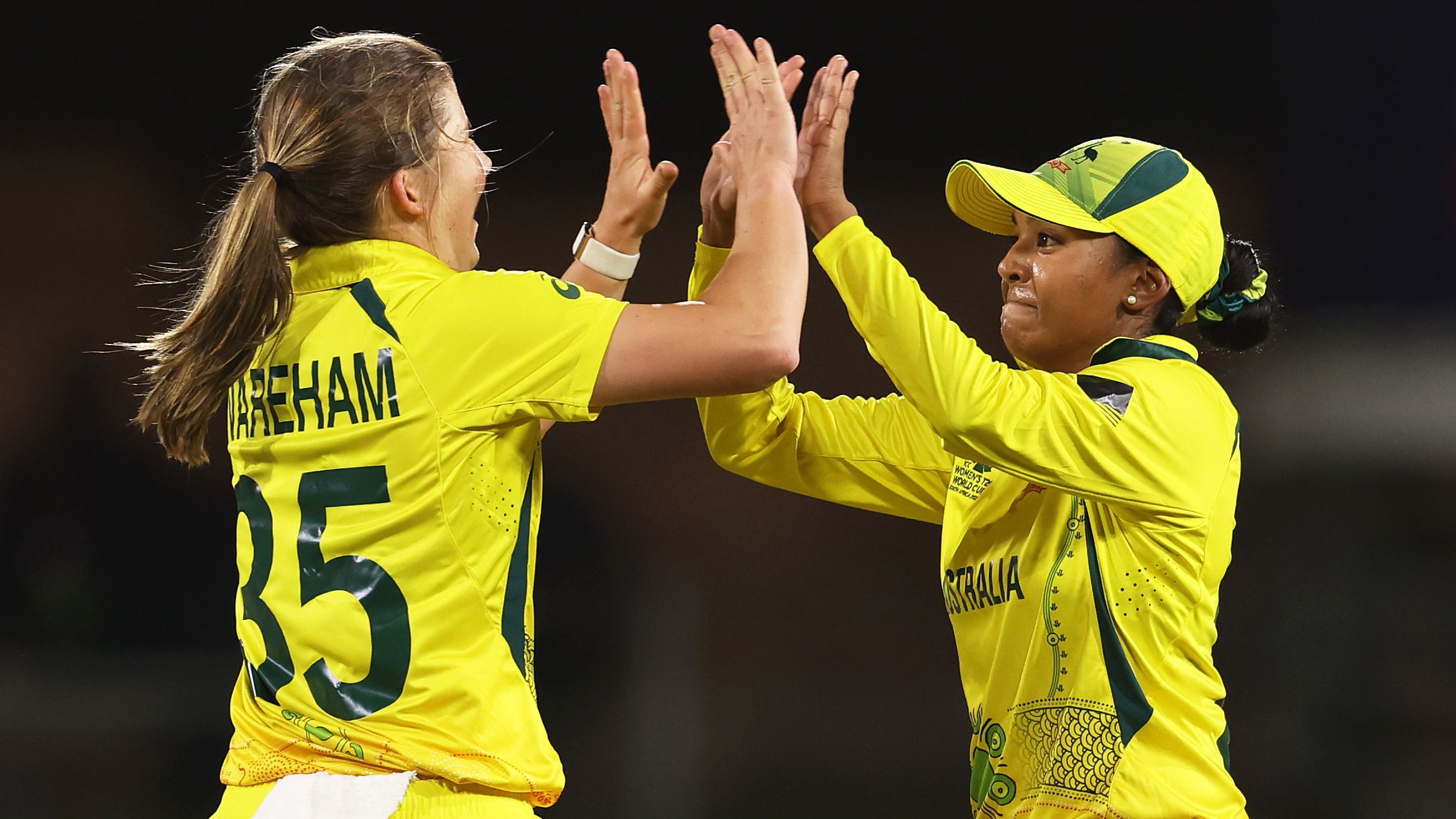 GQEBERHA, SOUTH AFRICA - FEBRUARY 14: Georgia Wareham of Australia celebrates the wicket of Sobhana Mostary of Bangladesh with team mate Alana King during the ICC Women&#x27;s T20 World Cup group A match between Australia and Bangladesh at St George&#x27;s Park on February 14, 2023 in Gqeberha, South Africa. (Photo by Matthew Lewis-ICC/ICC via Getty Images)