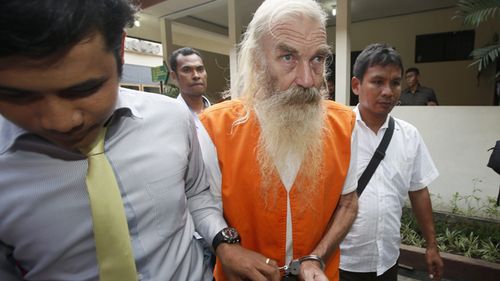 Robert Ellis is shackled and led towards a Bali courthouse during his trial in October, 2016. Source: AAP