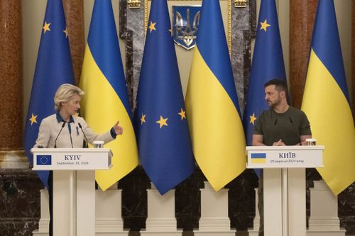 Ukrainian President Volodymyr Zelenskyy, right, and European Commission President Ursula von der Leyen