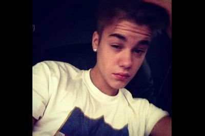 Justin does the "I just woke up" face.