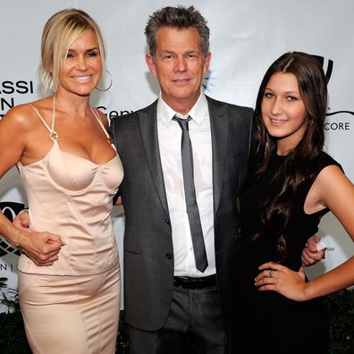 Bella Hadid with mum Yolanda and then-stepdad David Foster arrive at the Andre Agassi Foundation for Education's 15th Grand Slam for Children benefit concert at the Wynn Las Vegas October 9, 2010 in Las Vegas, Nevada. 
