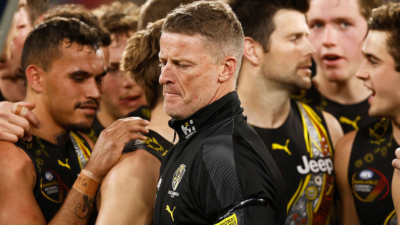 Tigers head coach Damien Hardwick speaks to his players during the round 17 AFL match between Richmond Tigers and Collingwood Magpies at Melbourne Cricket Ground on July 11, 2021 in Melbourne, Australia. (Photo by Daniel Pockett/AFL Photos/via Getty