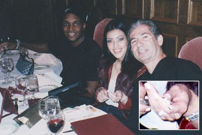 In this pic, Kim shows off her modest engagement ring with Damon and her late father Robert Kardashian.<br/><br/>Image: Radar Online