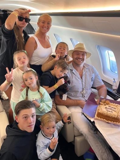 Tyson and Paris Fury with their brood of seven children.