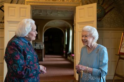 Queen Elizabeth meets Angela Wood, the women who helped create the Coronation Chicken recipe, during a reception in the Ballroom of Sandringham House
