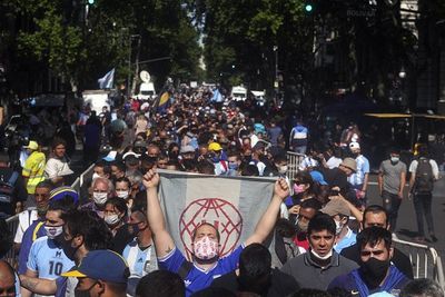 Thousands gather outside Maradona's funeral