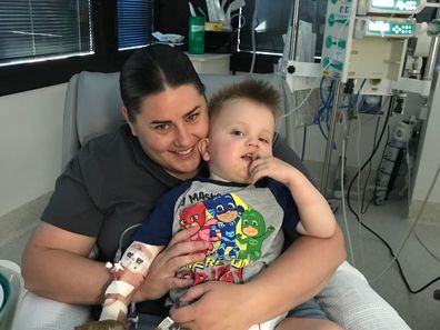 Spencer McPherson with his mum in hospital.