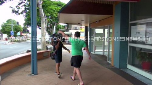 The incident ended in a scuffle between a 9NEWS cameraman and the accused woman's son. (9NEWS)