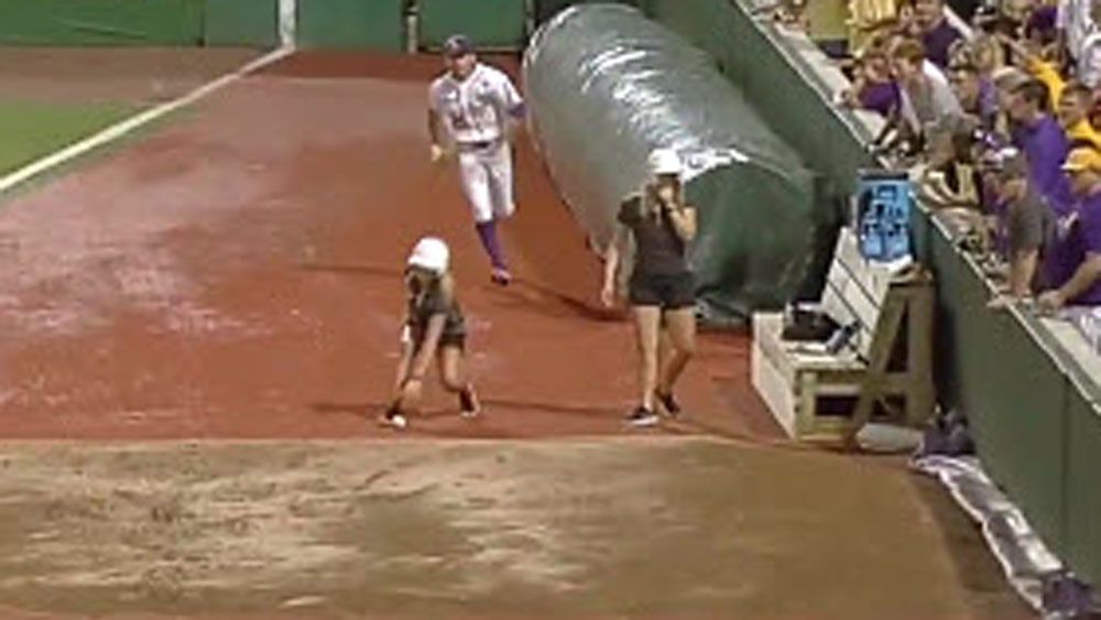 Baseball: Ball girl turns on home team with innocent gesture