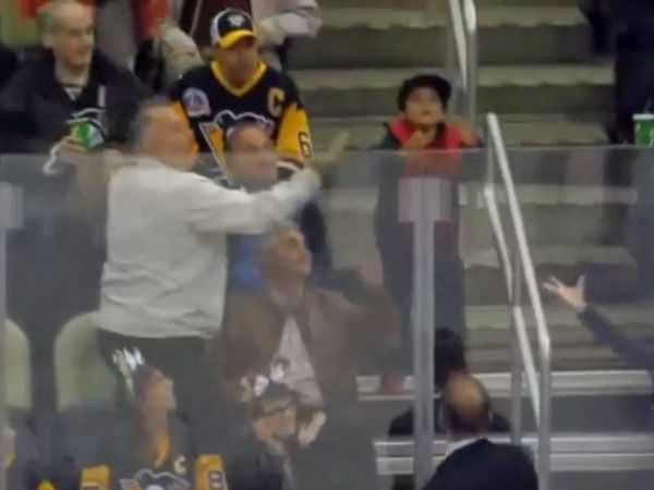 Man steals trophy puck from young boy