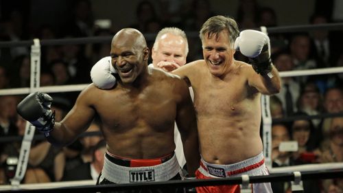 Mitt Romney and Evander Holyfield after the fight. (AAP)