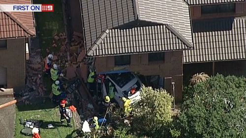 A car has crashed into a house at Carlingford, in Sydney's north west. (9NEWS)