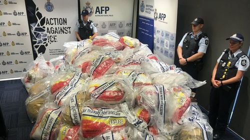 Eight men were charged after a record 1.2 tonnes of meth worth more than $1 billion was seized in December last year. (AAP)