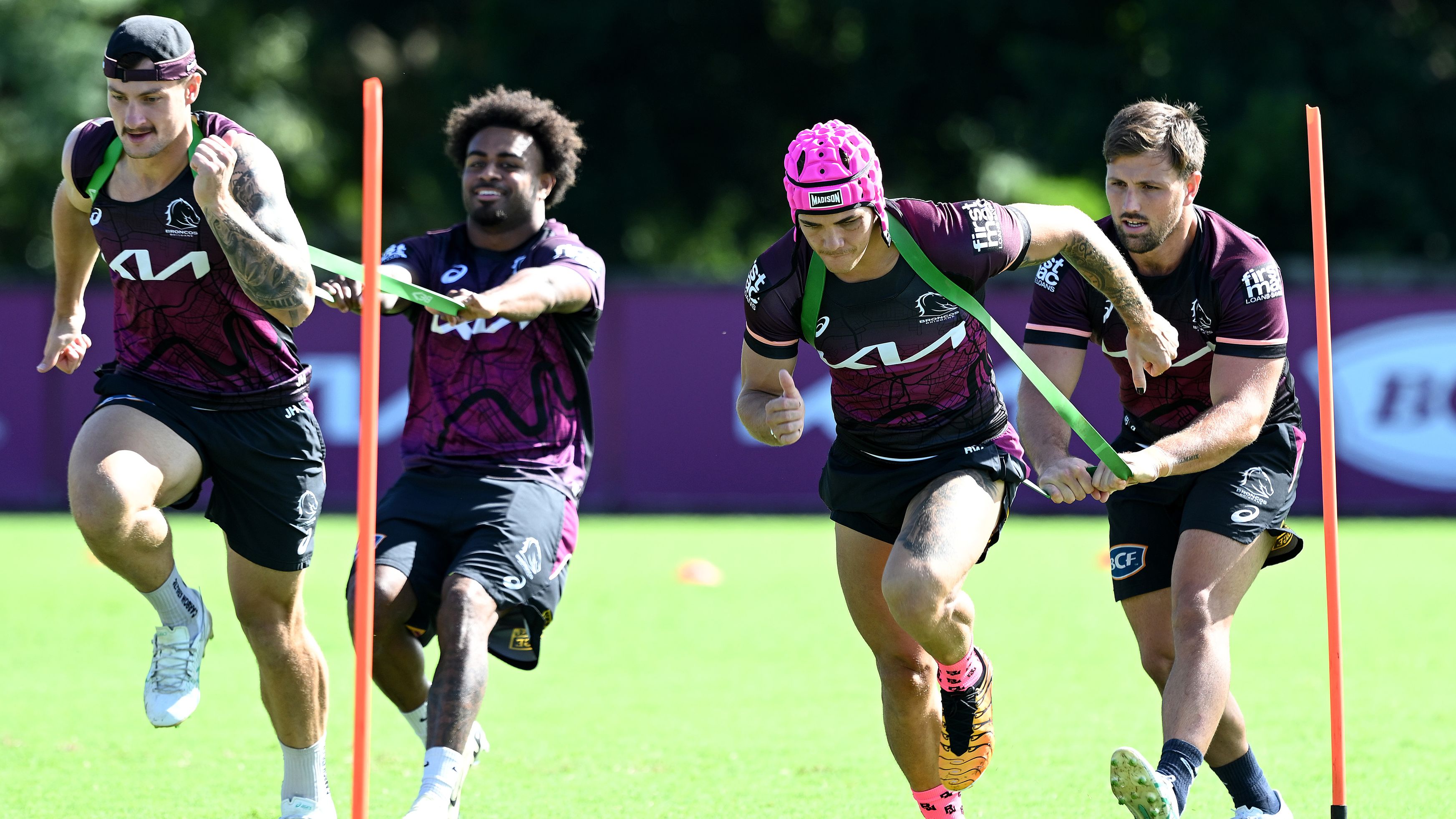 Reece Walsh competes in a training drill during a Broncos training session. (Photo by Bradley Kanaris/Getty Images)