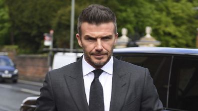 Football star David Beckham arrives at Bromley Magistrates Court for a hearing after he was spotted using his mobile phone while driving his Bentley, in London, Thursday, May 9, 2019. The magistrate has the power to impose six penalty points and a £200 fine for the charge of using a mobile while driving. (Victoria Jones/PA via AP)