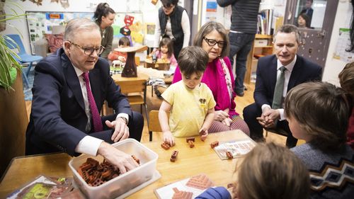 Prime Minister Anthony Albanese and Minister for Education Jason Clare at a childcare centre.