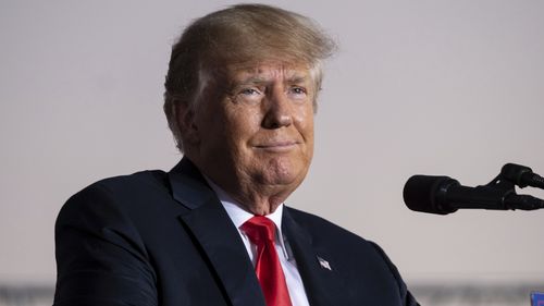 FILE - Former President Donald Trump speaks during a rally in Perry, Ga., on Sept. 25, 2021. As Trump's lawyers try to block the White House from releasing records to the congressional committee investigating the Jan. 6 Capitol insurrection, the former president faces a flurry of other investigations that could come to a head in the coming weeks and the new year. That includes two major state criminal investigations  one in New York and one in Georgia  and lawsuits concerning sexual assault alle