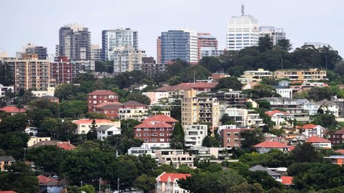 Tumbling house prices in Sydney and Melbourne are the main drivers behind the first annual drop in national property prices in six years, a new report shows. Picture: AAP