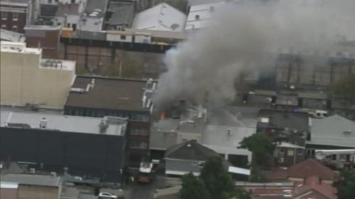 A building on fire at Crows Nest in Sydney's north. (9NEWS)