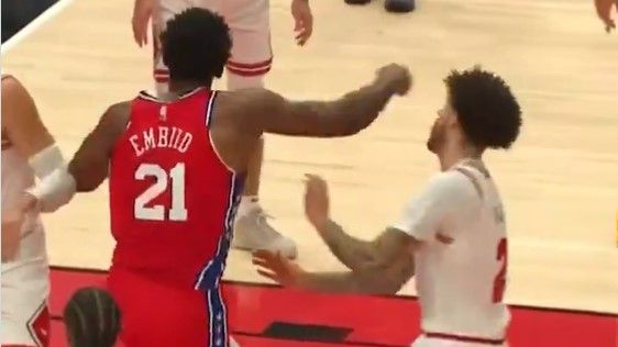 Joel Embiid almost accidentally punches Lonzo Ball.