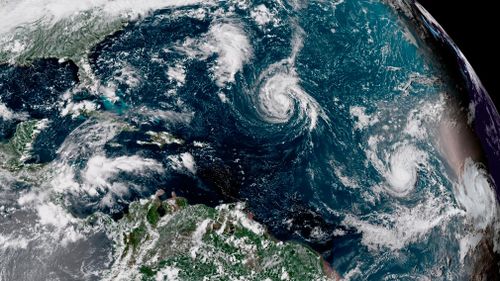 Tropical Storm Florence is becoming a "better organised" weather system that will likely strengthen into a hurricane late today, weather forecasters are warning.