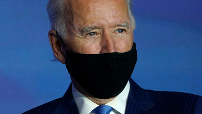 President-elect Joe Biden listens during an event to announce his choice for several positions in his administration at The Queen theater in Wilmington, Delaware. (AP Photo/Susan Walsh, File)