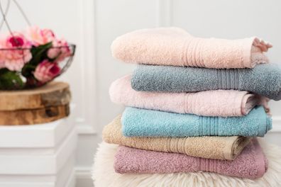 Stack of folded towels in bathroom