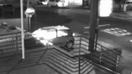 Security vision shows the moment the 63-year-old sets himself on fire inside his car. Picture: 9NEWS