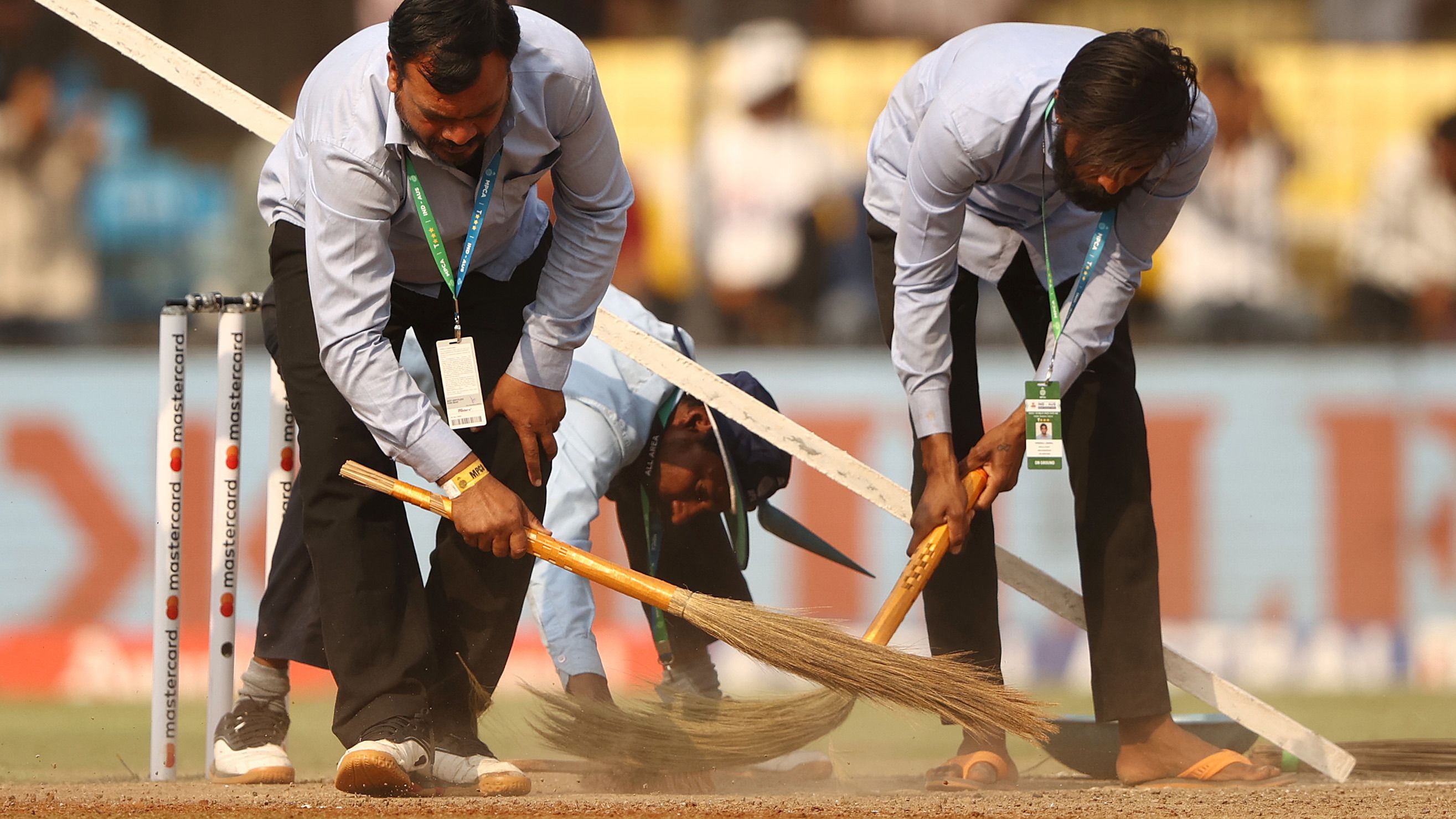 INDORE, INDIA - MARCH 01: The pitch is swept at the drinks break during day one of the Third Test match in the series between India and Australia at Holkare Cricket Stadium on March 01, 2023 in Indore, India. (Photo by Robert Cianflone/Getty Images)