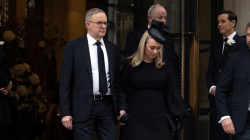 Anthony Albanese and Jodie Haydon leave for the Queen's funeral.