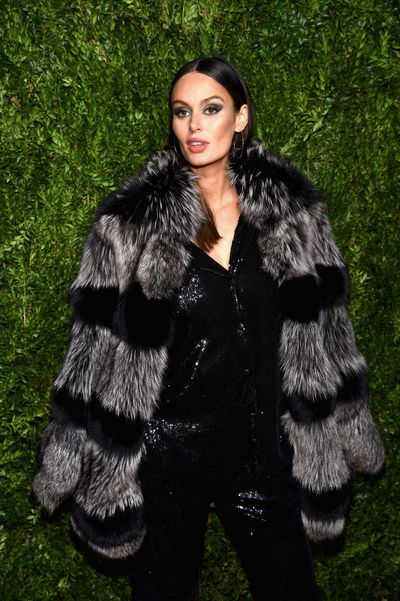 Nicole Trunfio made her first public appearance since
announcing the pregnancy of her second child, with husband Gary Clarke Jr, at
last night&rsquo;s CFDA/Vogue Fashion Fund Awards in New York City.<br />
<br />
Seemingly showing no plans to swap sleek, designer attire
for mumsy maternity wear, the Australian model walked the red carpet in a
sequinned pantsuit and black fur coat alongside some of the fashion industry&rsquo;s
most powerful names.<br />
<br />
Model and body activist Ashley Graham appeared in a white,
skin-tight dress from knitwear designer Victor Glemaud, model Arizona Muse
beamed in an orange gown from Stella McCartney and Nicki Minaj wore custom-made
Alexander Wang.<br />
<br />
The awards, which honour emerging American designers, saw
Liberian-American designer Telfar Clemens take out the top honours as emerging
talent of the year.<br />
<br />
Clemens launched his New York-based unisex line in 2005 and
his designs have seen on the likes of Solange Knowles.<br />
<br />
Click through to see more of Nicole, Ashley and the other
A-list celebrities at the 2017 CFDA/Vogue Fashion Fund Awards.