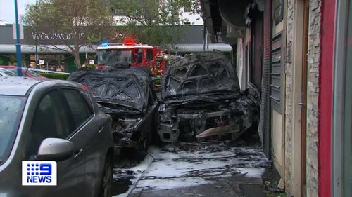 It's understood a stolen Holden Cruz was parked outside the tobacco shop and set alight.