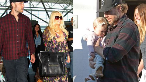 Dad duty: Jessica Simpson's fiancée Eric Johnson takes baby for a stroll