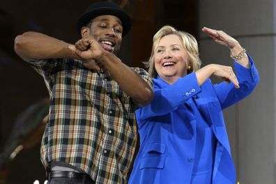 Democratic presidential candidate Hillary Rodham Clinton, right, practices her dance moves with DJ Stephen "tWitch" Boss during a break in the taping of "The Ellen DeGeneres Show" in New York on Sept. 8, 2015.