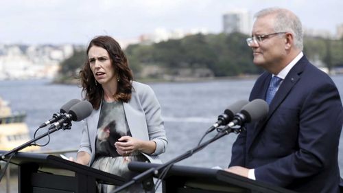 Jacinda Ardern and Scott Morrison at a press conference outside Kirribilli House.