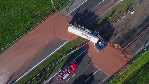 The truck was carrying 12 tons of liquid milk chocolate. (AP)