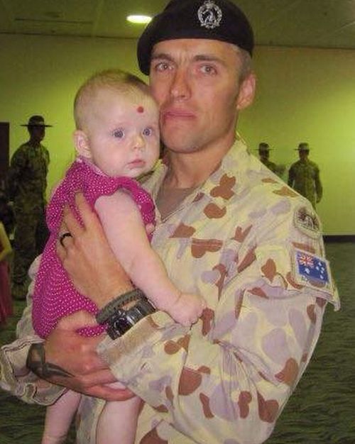 Matt Page, pictured with baby Willow, as he was preparing to to return to Afghanistan after a 10-day period of leave.