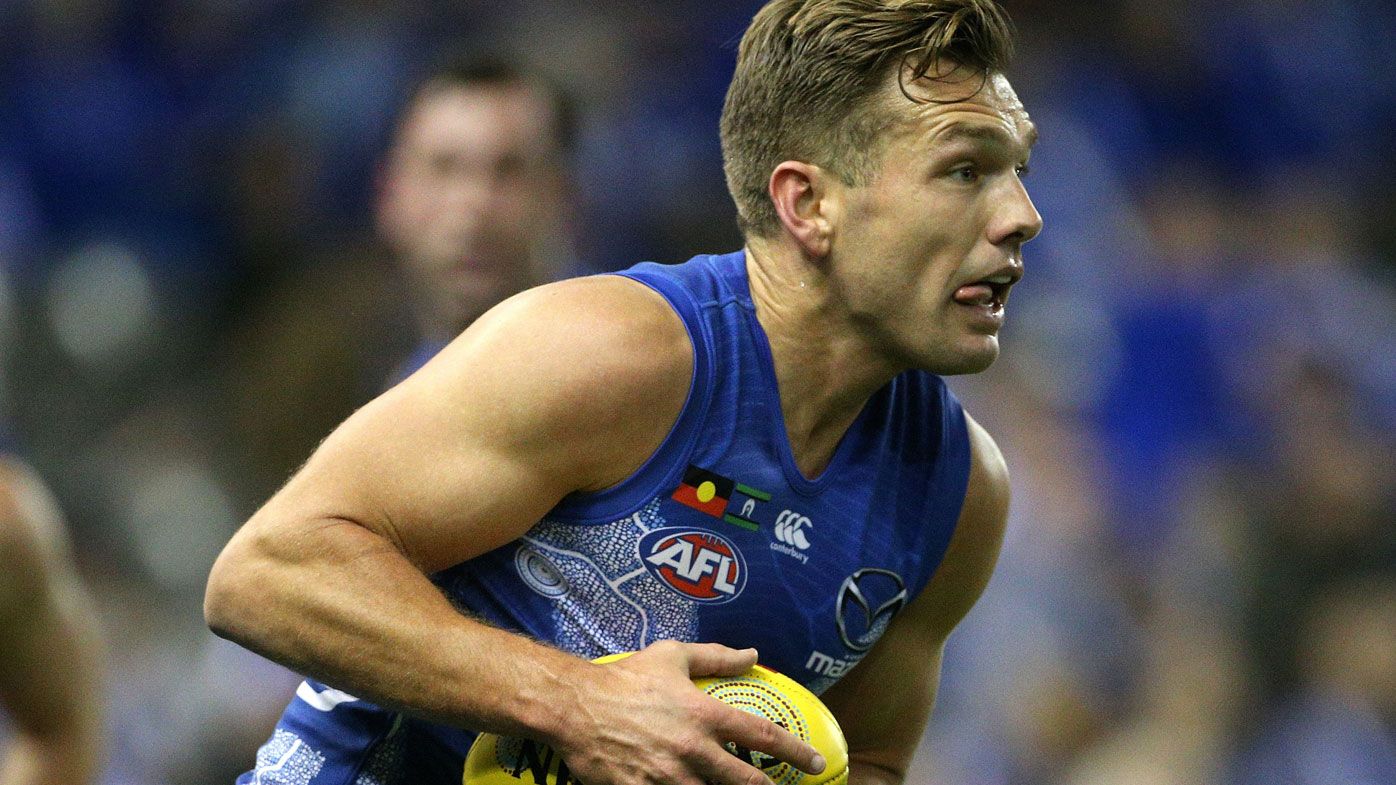 North Melbourne Kangaroos cruise past wounded Brisbane Lions in AFL