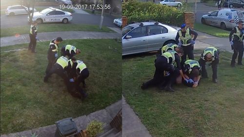 CCTV shows the officers pinning the man down and repeatedly striking him with a baton. (Fairfax Media)