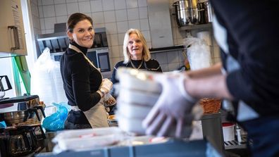 Sweden's Crown Princess Victoria volunteers to pack boxes at Stockholm City Mission foodbank