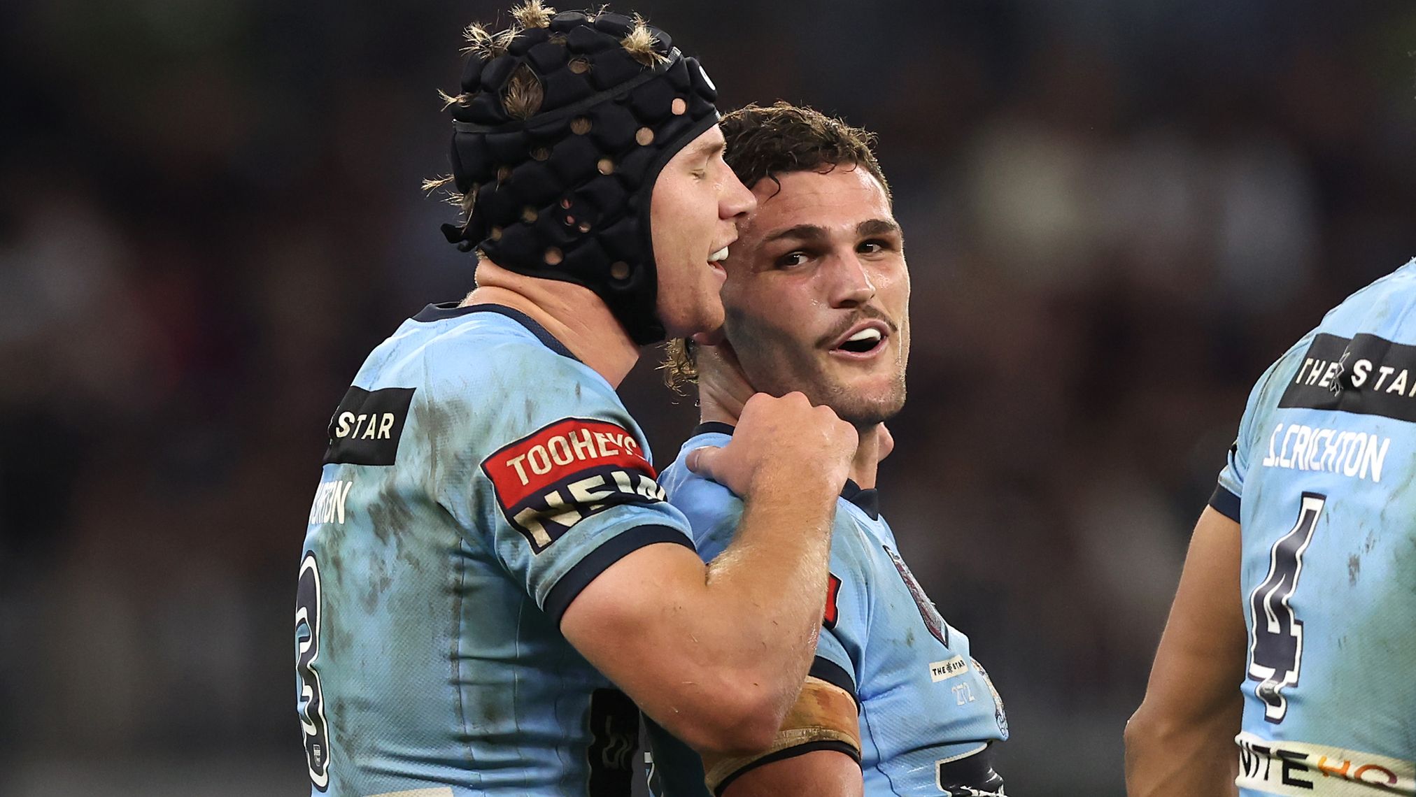 Matt Burton celebrates with Blues teammate Nathan Cleary during the second State of Origin game.
