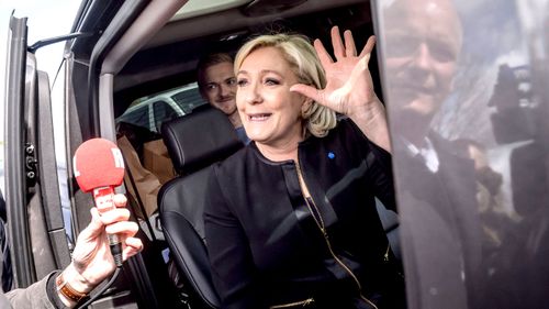 Marine Le Pen upstages frontrunner Macron in surprise visit