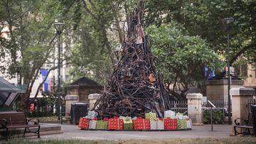 A burnt Christmas tree has been erected in the heart of Sydney.
