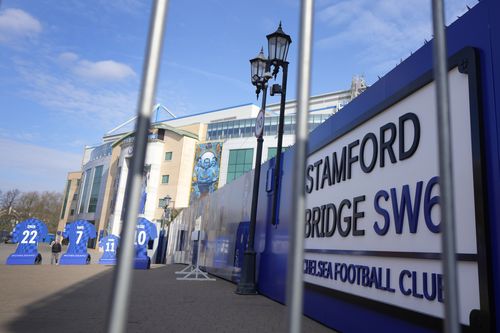 A view through railings of Chelsea football club's Stamford Bridge stadium in London, Thursday, March 10, 2022. 